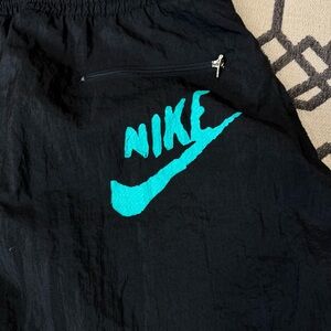 Nike Black Joggers with Teal Logo